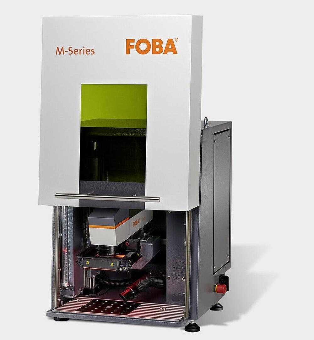 The FOBA M1000: a 0.45 m² footprint, a 450 x 250 mm work space, and Class 1 operation on a standard single-phase circuit. Image courtesy of FOBA.